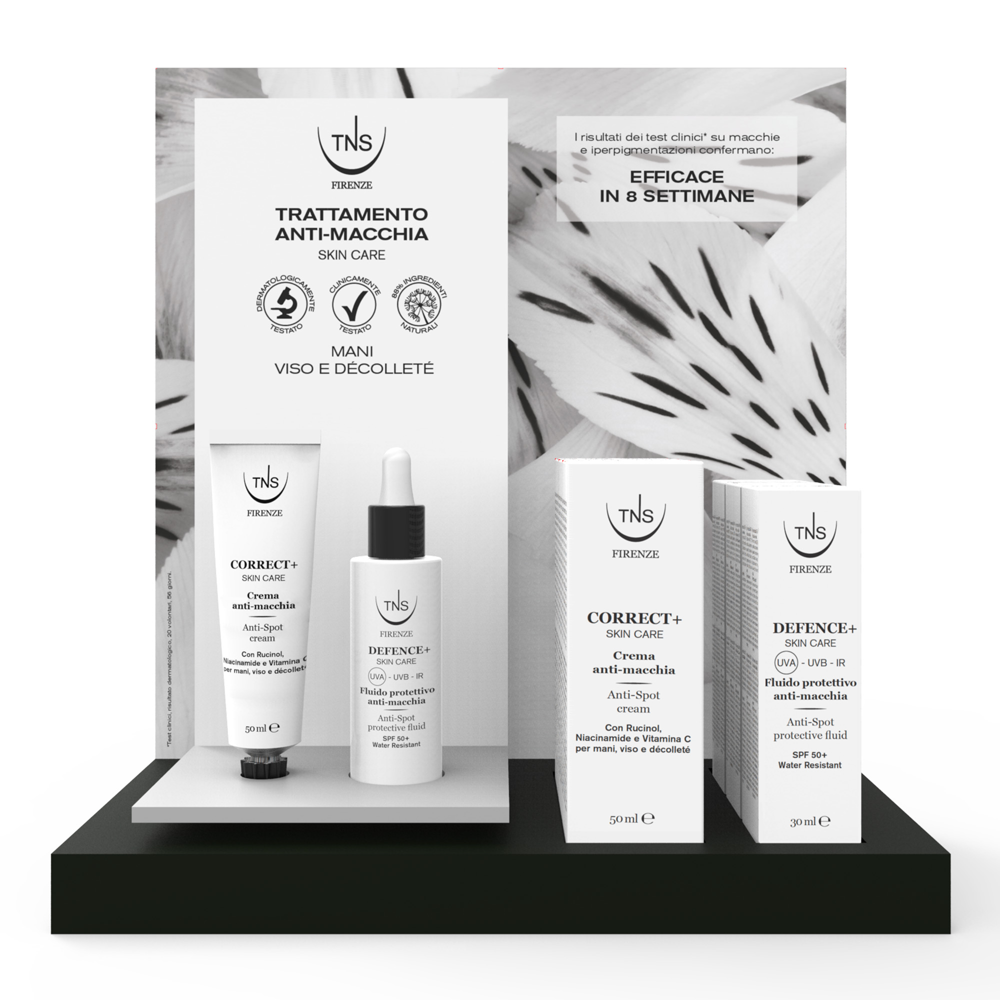 Display with Correct+ anti-stain cream and Defence+ SPF50 sun protection fluid for hands, face, décolleté TNS