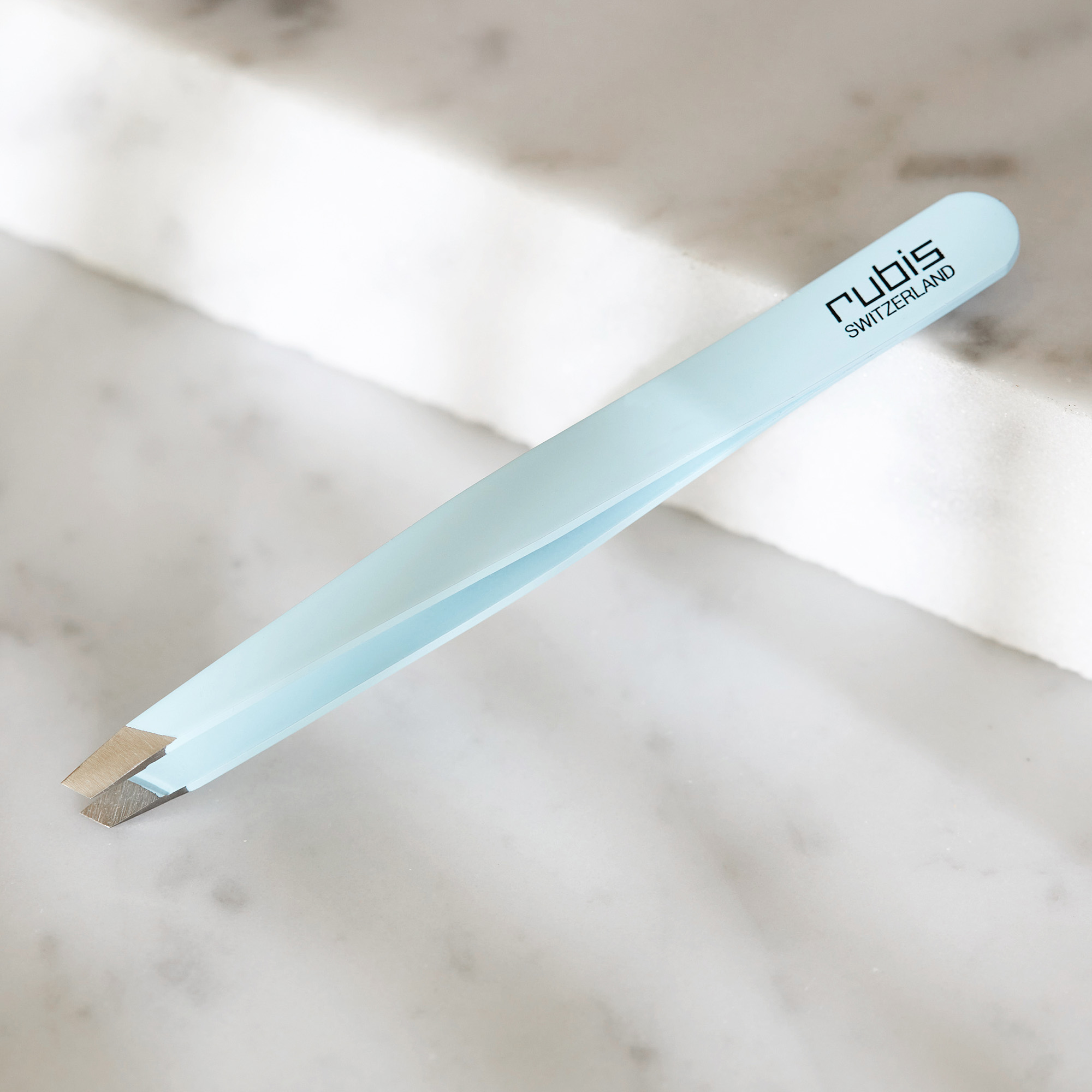 Rubis stainless steel tweezers with slant tip light blue